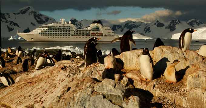 Pat and Rosemarie Keough with Seabourn President Richard Meadows. The Keoughs are part of the Antarctic expedition team, 2014.