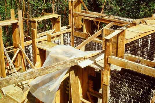 bottle house under construction 